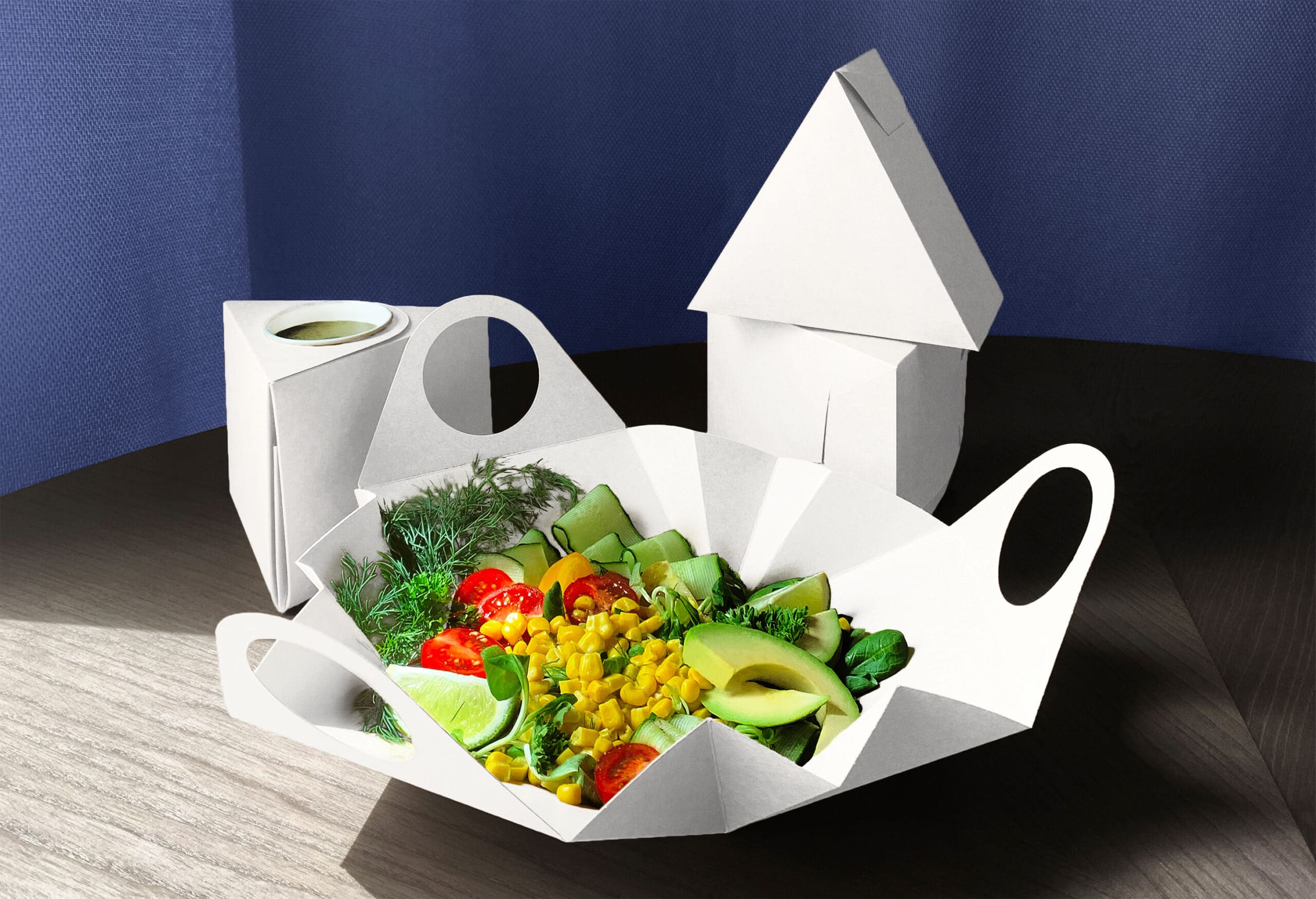 open triangle packaging with salads - packneat